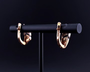 Gold earrings with zircons