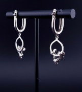 Silver earrings with zircons