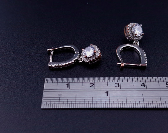 Silver earrings with zircons