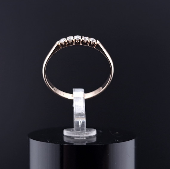 Gold ring with zircons