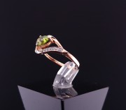 Gold ring with diamonds and colored stone