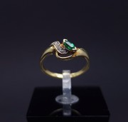 Gold ring with diamonds and colored stone