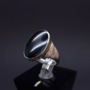 Silver ring with colored stone