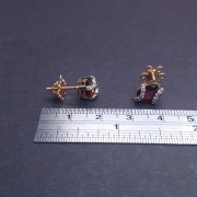 Gold earrings with diamonds and colored stones