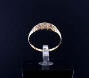 Gold ring with zircons