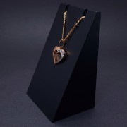 Gold pendant with zircons