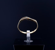 Gold ring with zircons