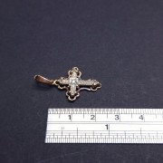 Gold cross with diamond