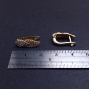 Gold earrings with zircons 