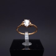 Gold ring with zircons