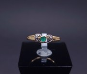 Gold ring with colored stones