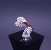 Gold ring with zircons