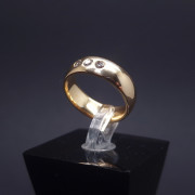 Gold wedding ring with diamonds