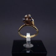 Gold ring with diamonds with sapphires