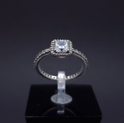 Silver ring with zircons