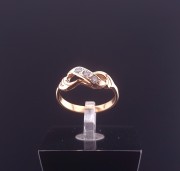 Gold ring with zircons