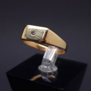 Gold wedding ring with diamond