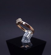 Gold ring with zircons