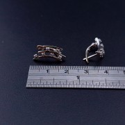 Gold earrings with zircons 