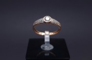 Gold ring with zircons