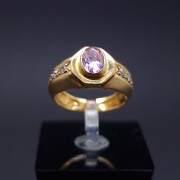 Gold ring with colored stones