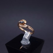 Gold ring with diamonds and sapphire