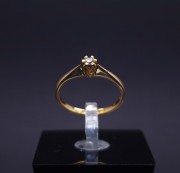 Gold ring with diamond