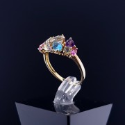 Gold ring with colored stones