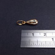 Gold pendant with zircon