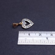 Gold pendant with zircons