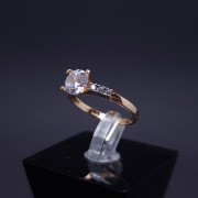 Gold ring with zircons