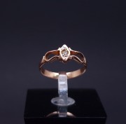 Gold ring with colored stone