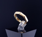 Gold ring with zircons