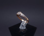 Gold ring with zircons