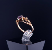 Vintage gold ring with colored stone