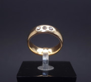 Gold wedding ring with diamonds