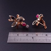 Gold earrings with colored stones