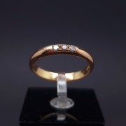 Gold wedding ring with diamonds