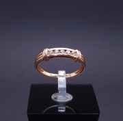 Gold ring with zircons