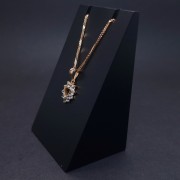 Gold pendant with zircons