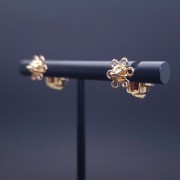 Gold earrings with diamonds and colored stones