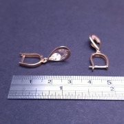 Gold earrings with zircons 