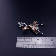 Gold pendant with colored stones
