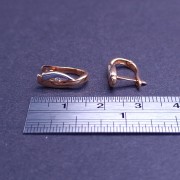 Gold earrings with zircons 