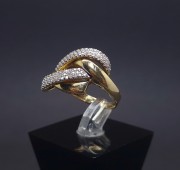 Gold ring with zircons