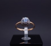 Gold ring with zircons