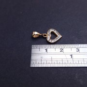 Gold pendant with zircons