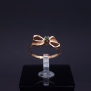 Gold ring with colored stone