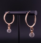 Gold earrings with zircons 