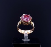 Gold ring with diamonds and moissanite